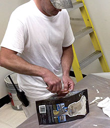 The Painter's Pouch fits brushes up to 5 inaches and rollers up to 9 inches.